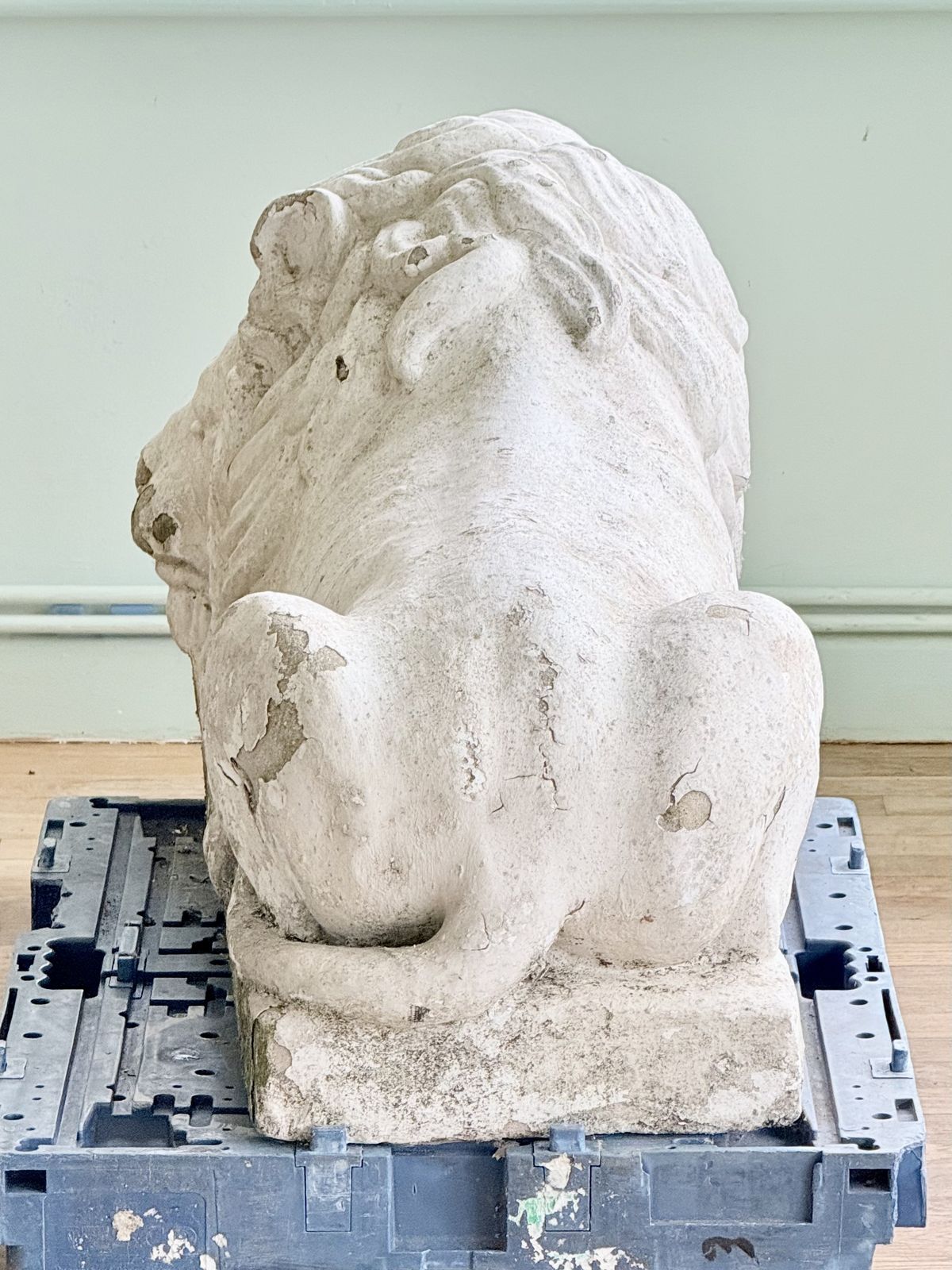 Cast stone lion after Canova, rear three-quarter view