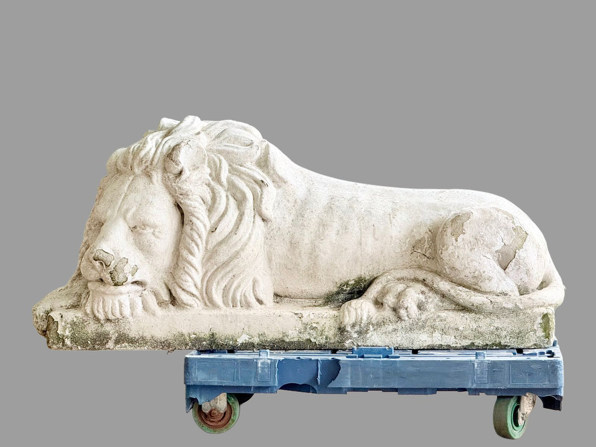 Cast stone lion after Canova, side profile