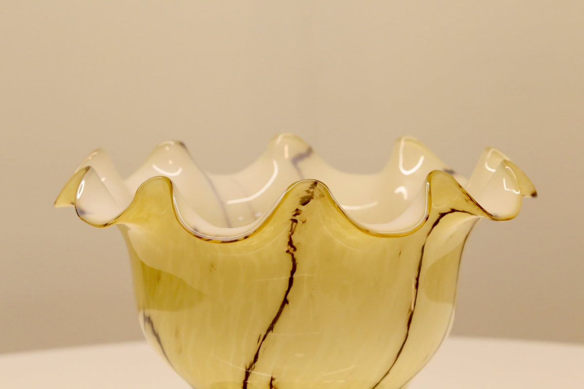 Close-up of ruffled rim and brown veining on Peill & Putzler glass shade