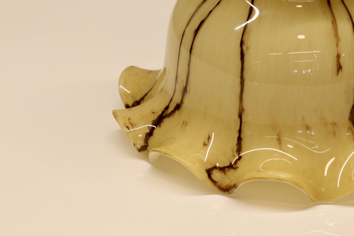 Close-up of ruffled amber glass edge, Peill & Putzler