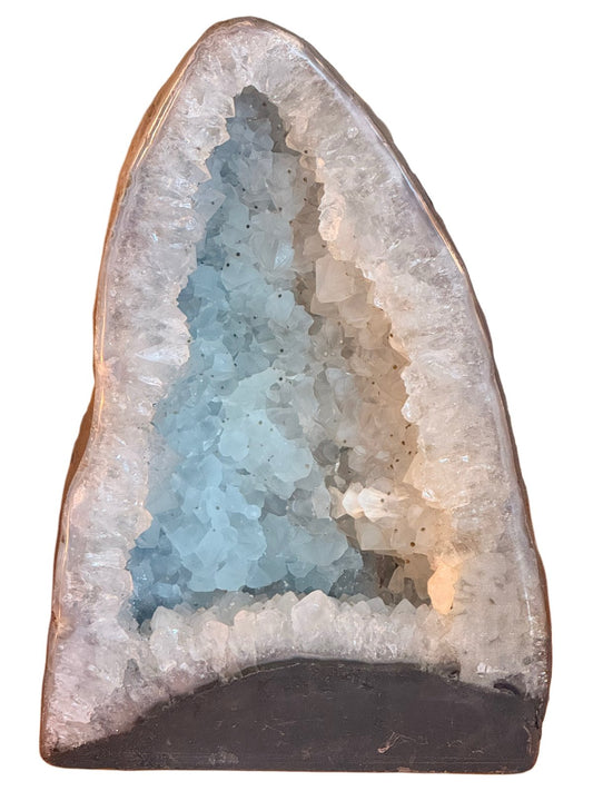Tall quartz cathedral geode, Brazil, 20th century, pale blue-white quartz crystals in a basalt shell