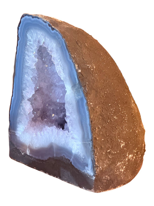 Amethyst cathedral geode from Brazil, three-quarter view showing rough exterior