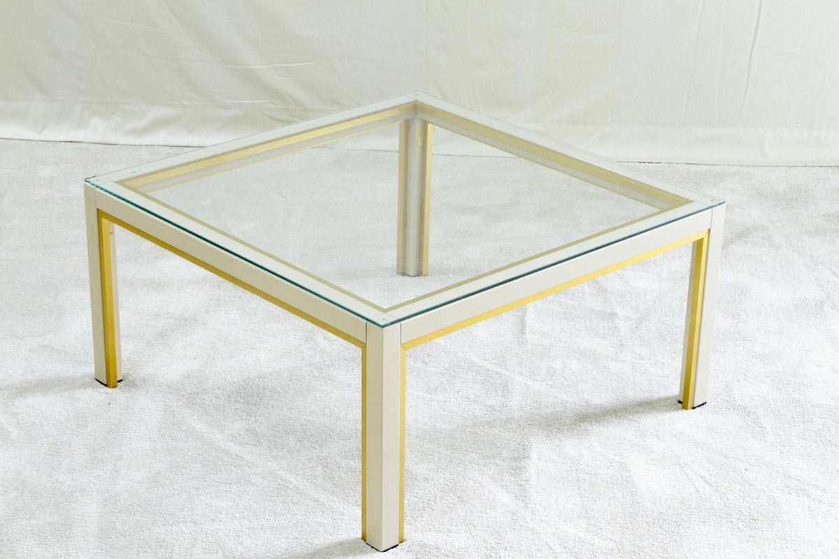 Renato Zevi gilt and lacquer coffee table with square clear glass top, angled view