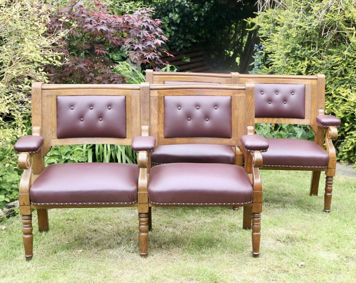 Two Islington Town Hall oak benches arranged together (sold separately)