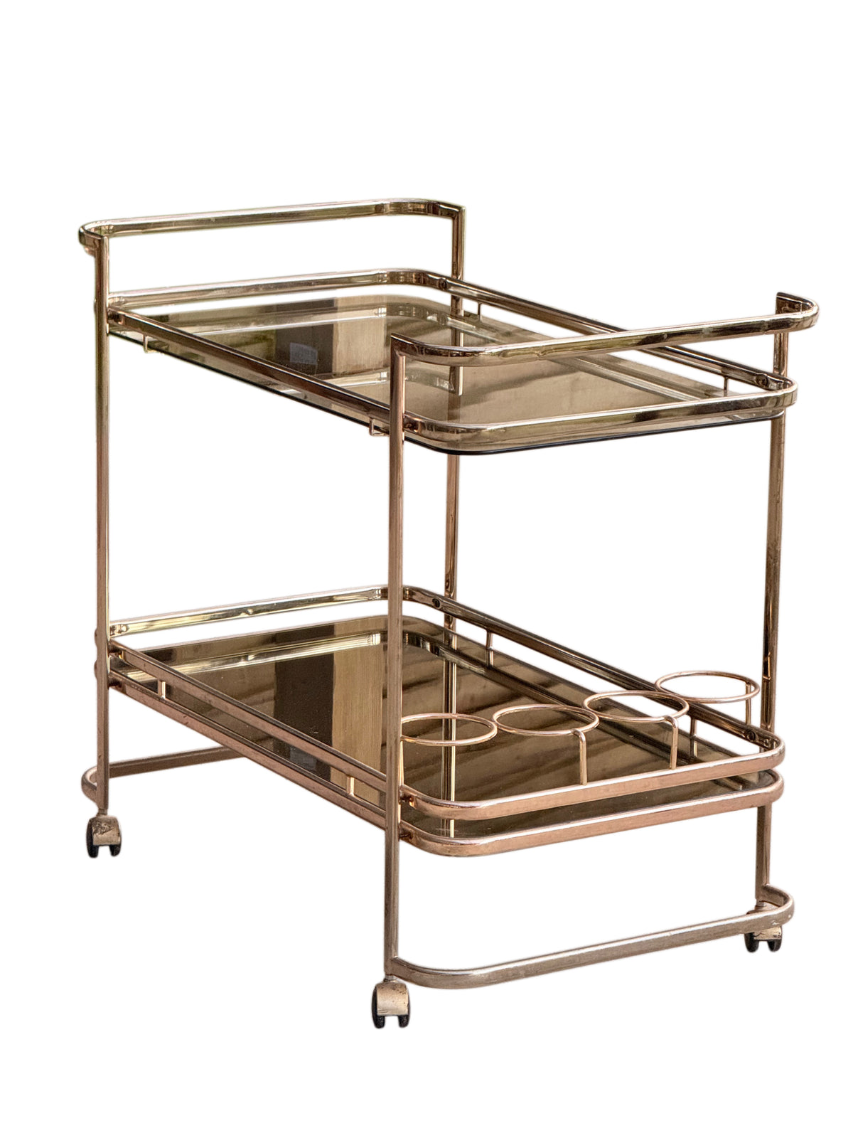Three-quarter view of the gilt brass-plated tubular bar cart with U-shaped end handles