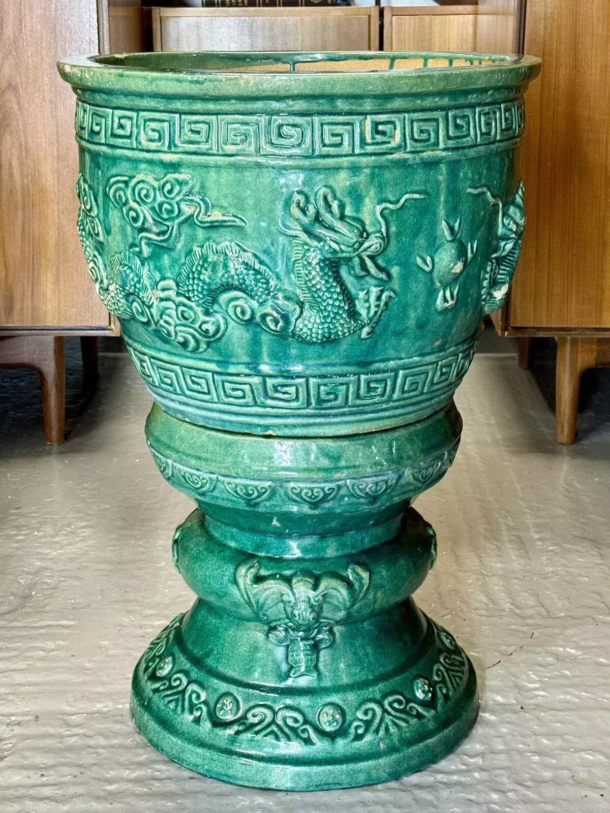 Chinese green dragon glazed jardinière on pedestal, angled close view