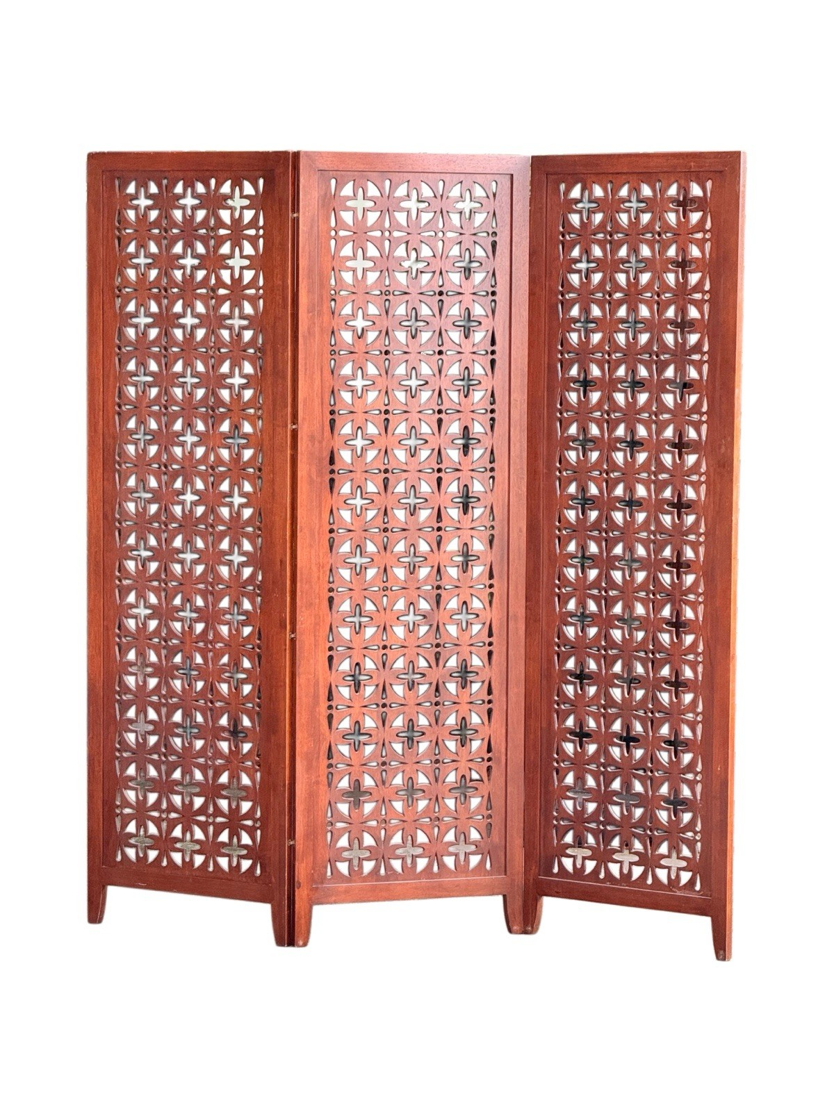 Mid-century solid teak three-panel pierced screen, c.1960s/70s, with repeating pierced geometric motifs