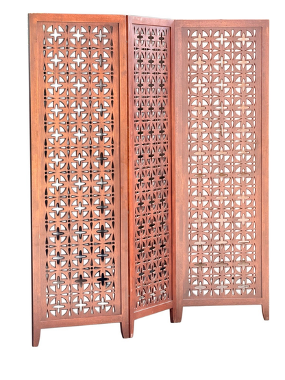Mid-century solid teak three-panel pierced screen, angled view