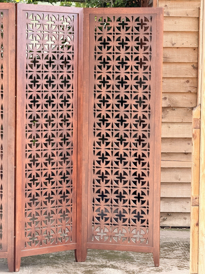 Two panels of the teak pierced screen, close view