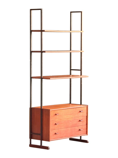 Mid-century teak and black metal free-standing shelving unit with three shelves and a chest of three drawers, full view
