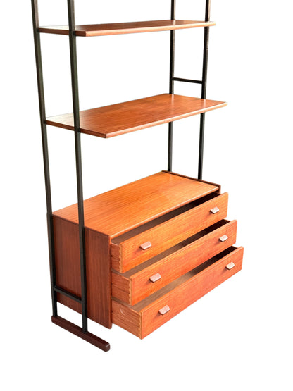 Teak shelving unit with the three dovetailed drawers pulled open