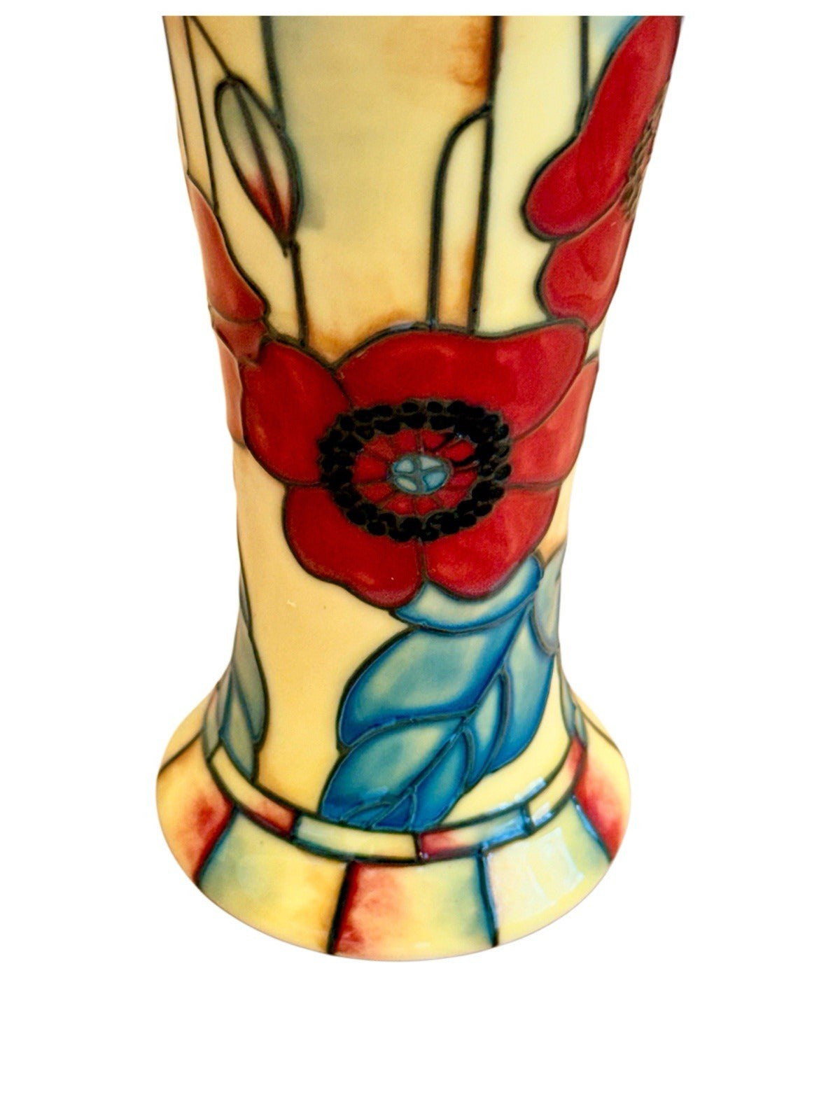 Close-up of hand-painted red poppy and tube-lined leaves
