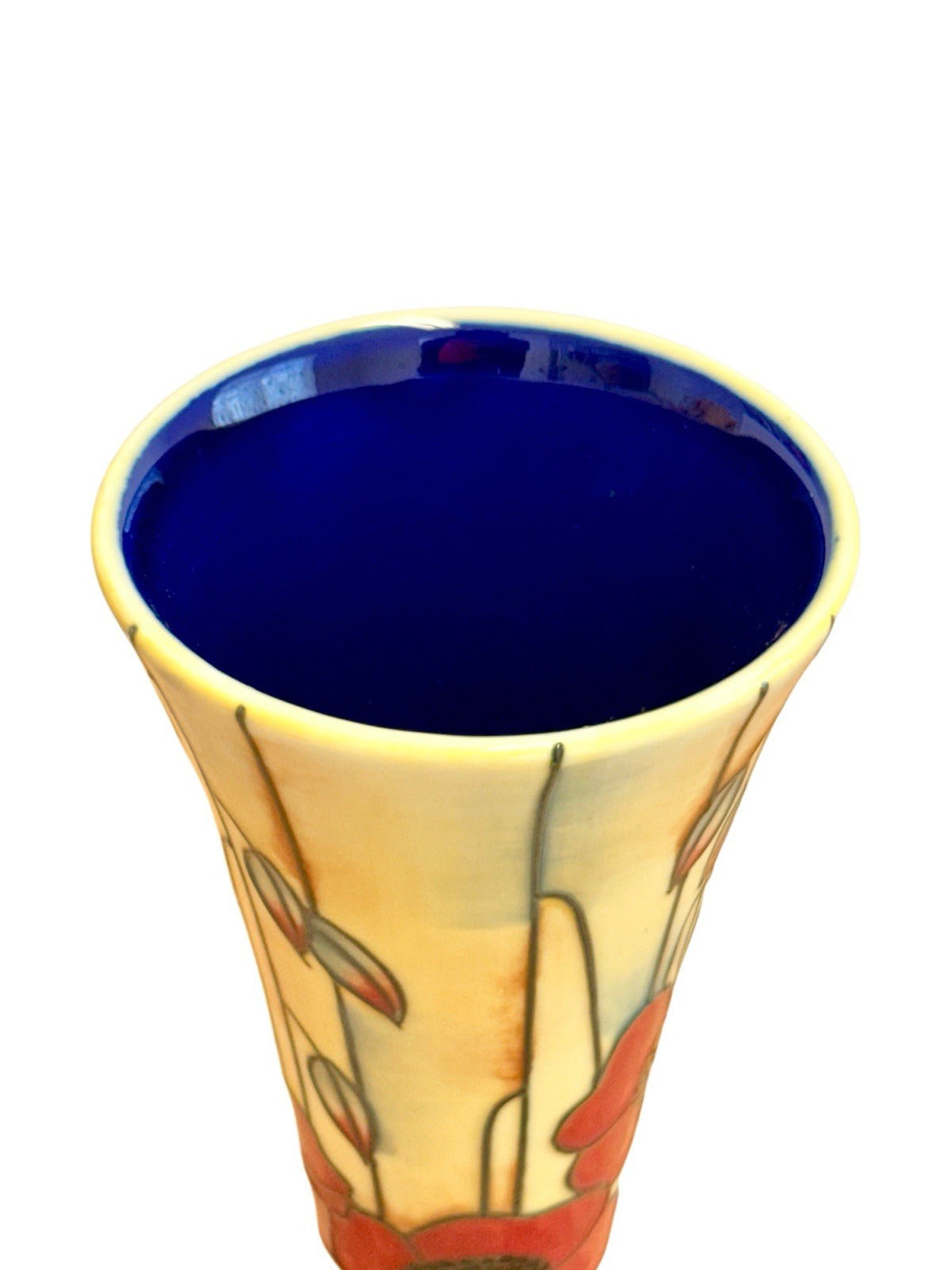 Close-up of the deep blue interior and rim of the Tupton Ware vase