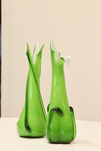 Pair of Fratelli Betti green glass vases, three-quarter view