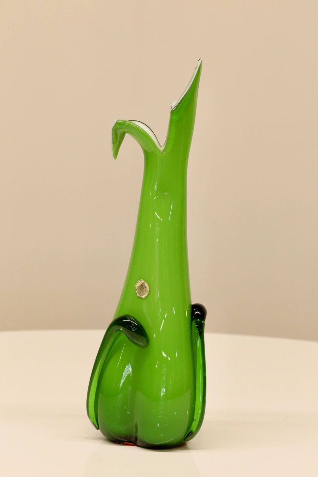 Empoli green glass vase with label, side view