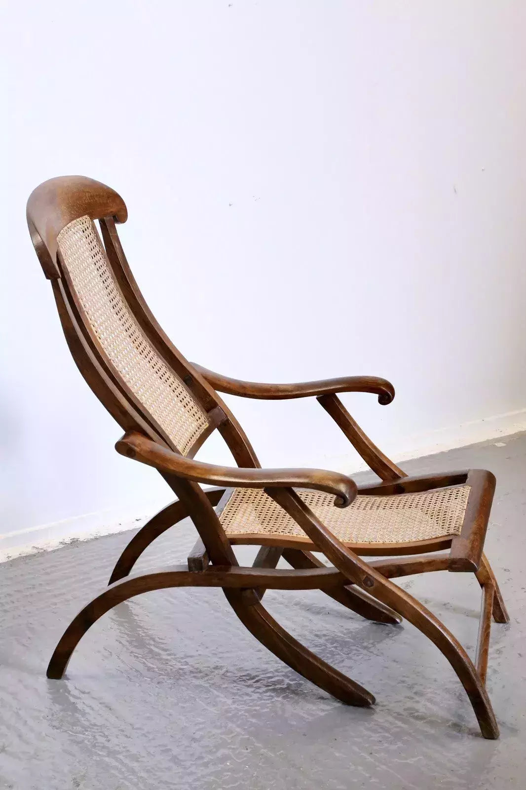 Victorian walnut and cane folding steamer chair, side profile