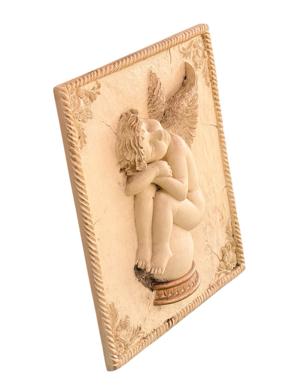 Victorian plaster cherub wall plaque with sleeping cherub, side view
