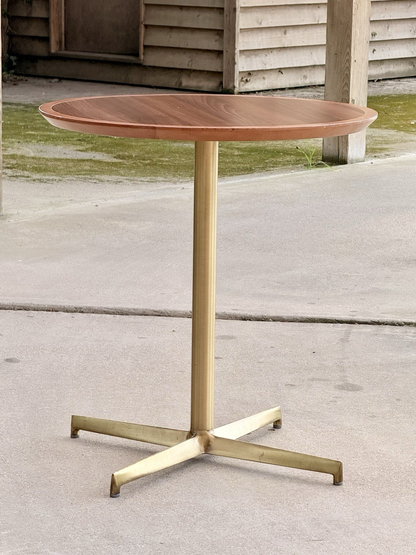 Pedrali mahogany finish side table, front view outdoors