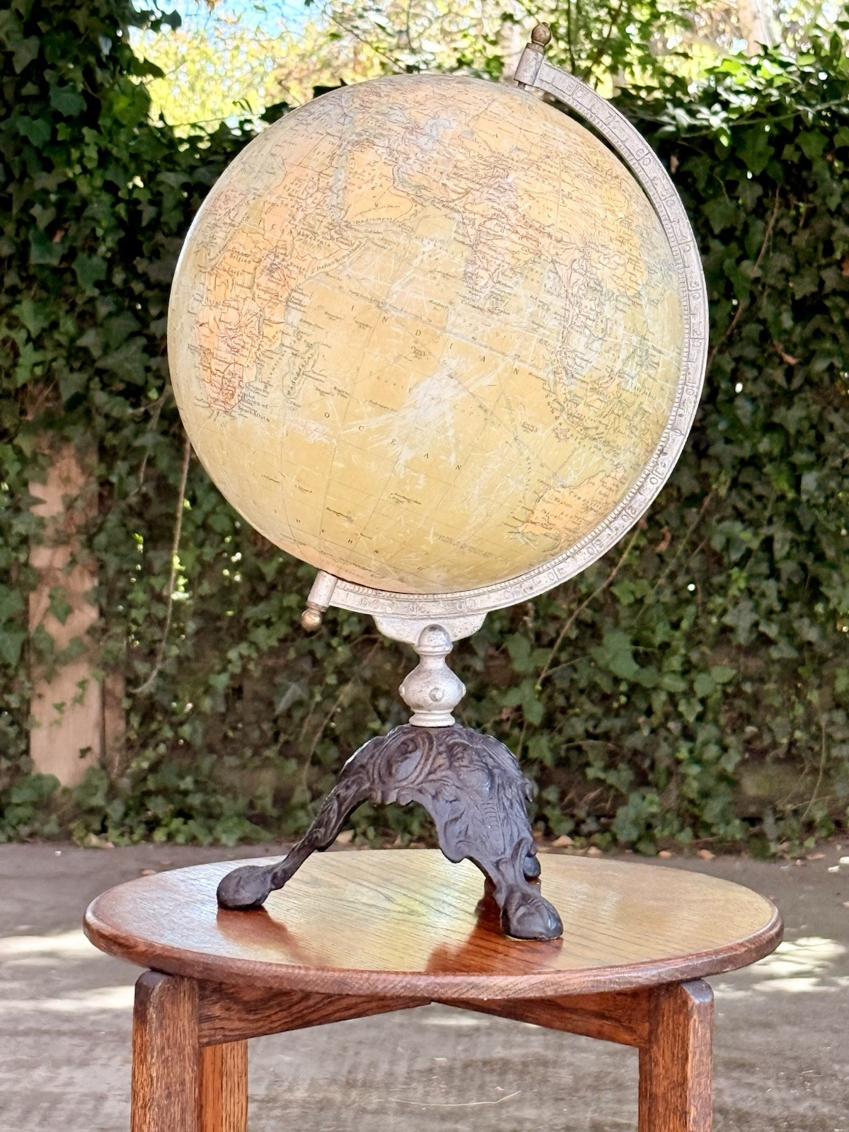 Philips 12 inch terrestrial globe, view against greenery