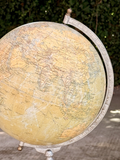 Close-up of Philips globe with Asia and Europe, metal meridian