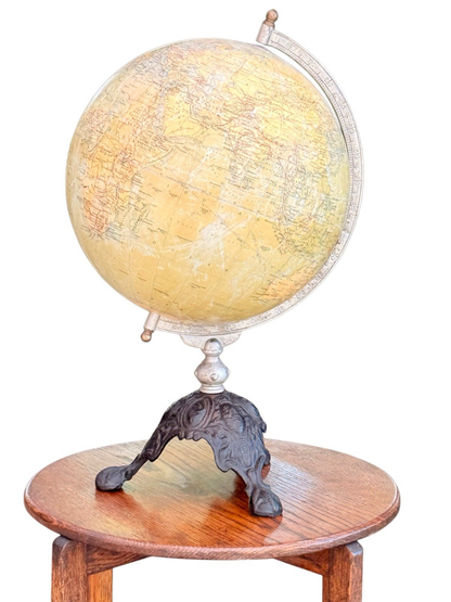 Philips 12 inch terrestrial globe, England c.1930s, printed paper gores, metal meridian and cast iron tripod base