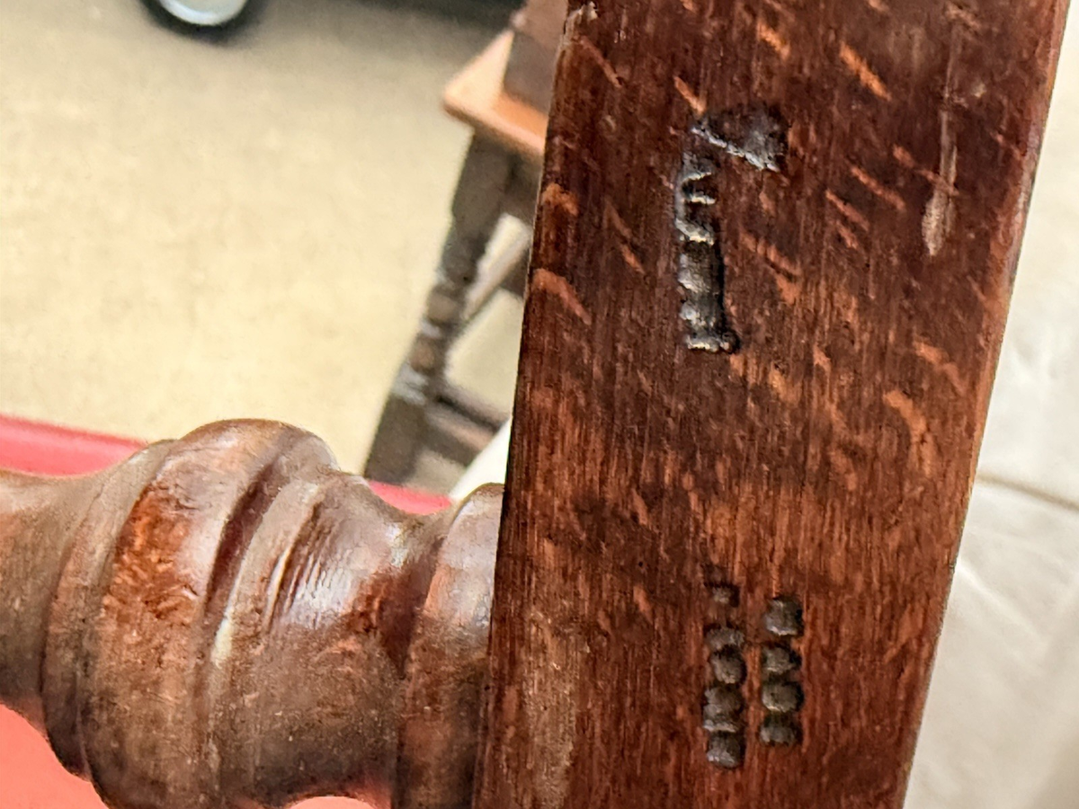 Close-up of stamped marks on the beech frame, Lottier slipper chair
