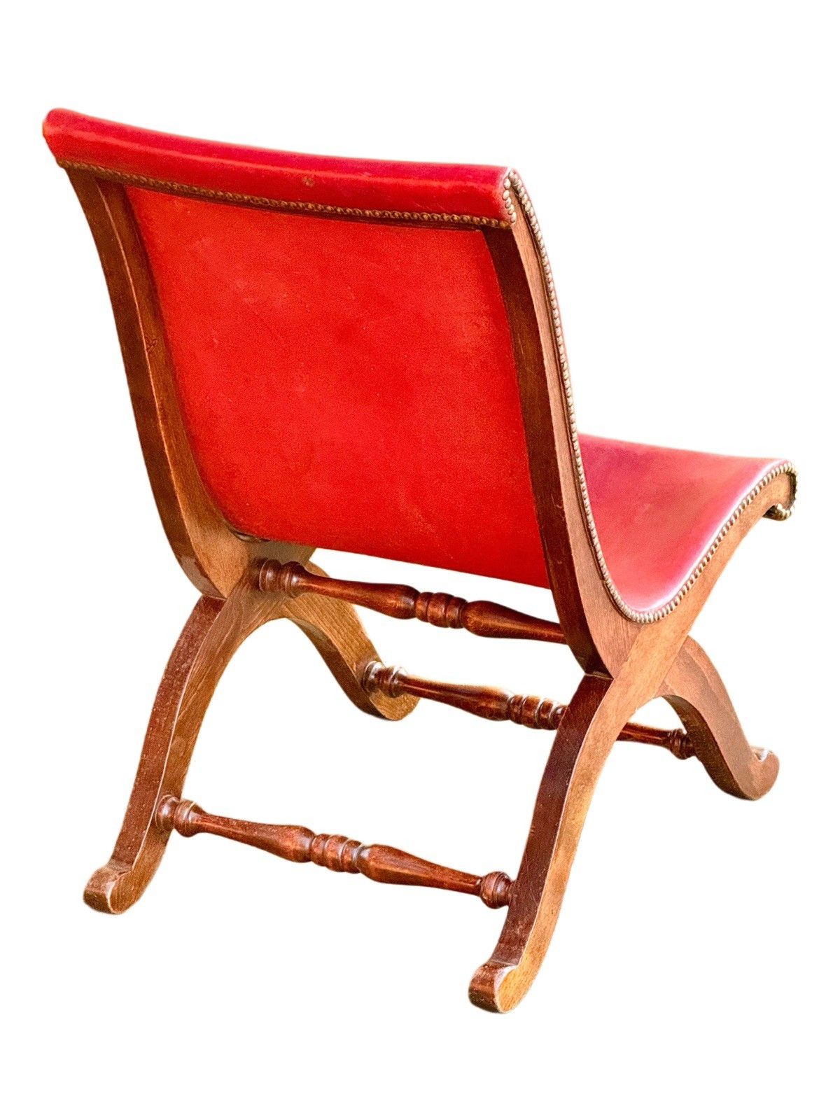 Back view of the Pierre Lottier for Valmazan red leather slipper chair