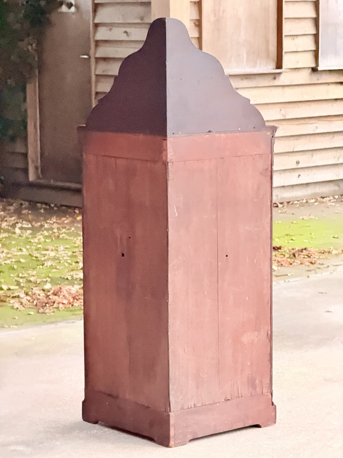 Back view of the mahogany corner cabinet