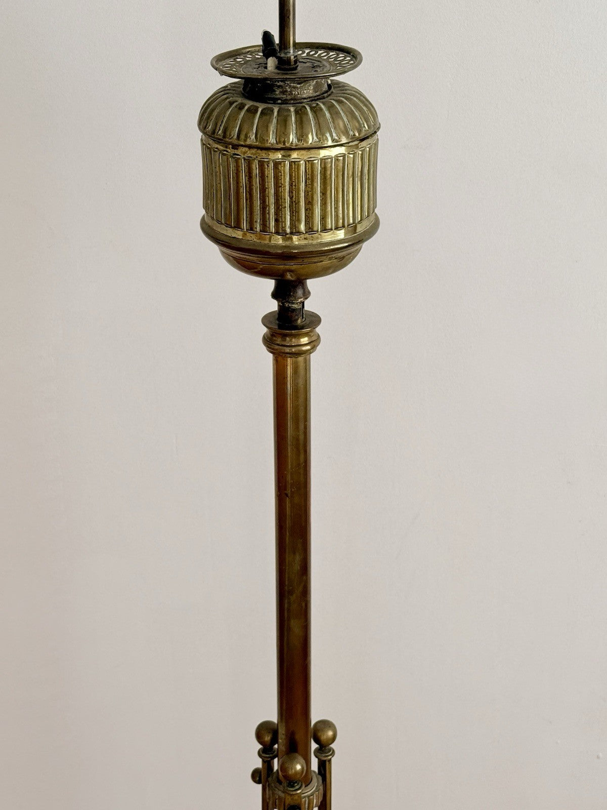 Close-up of the fluted urn top on the Hine & Co standard lamp