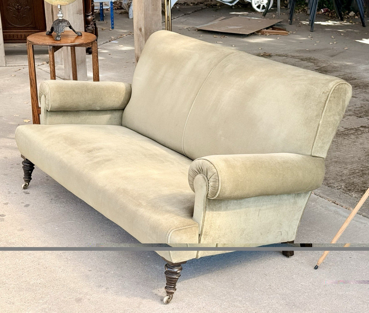 Sage velvet 19th-century sofa, three-quarter view from the left