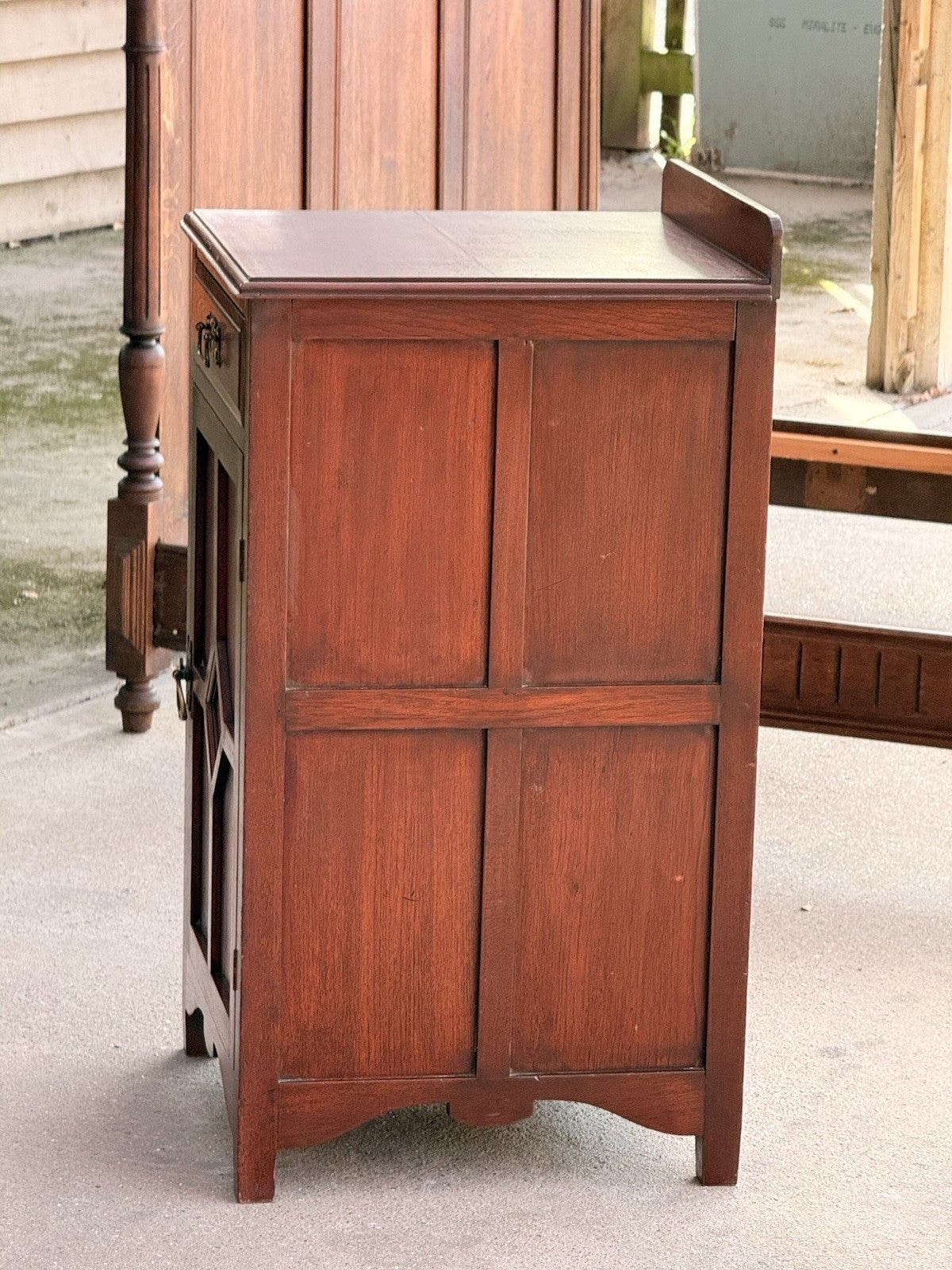 Arts & Crafts mahogany cabinet, rear three-quarter view