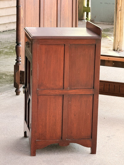 Arts & Crafts mahogany cabinet, rear three-quarter view