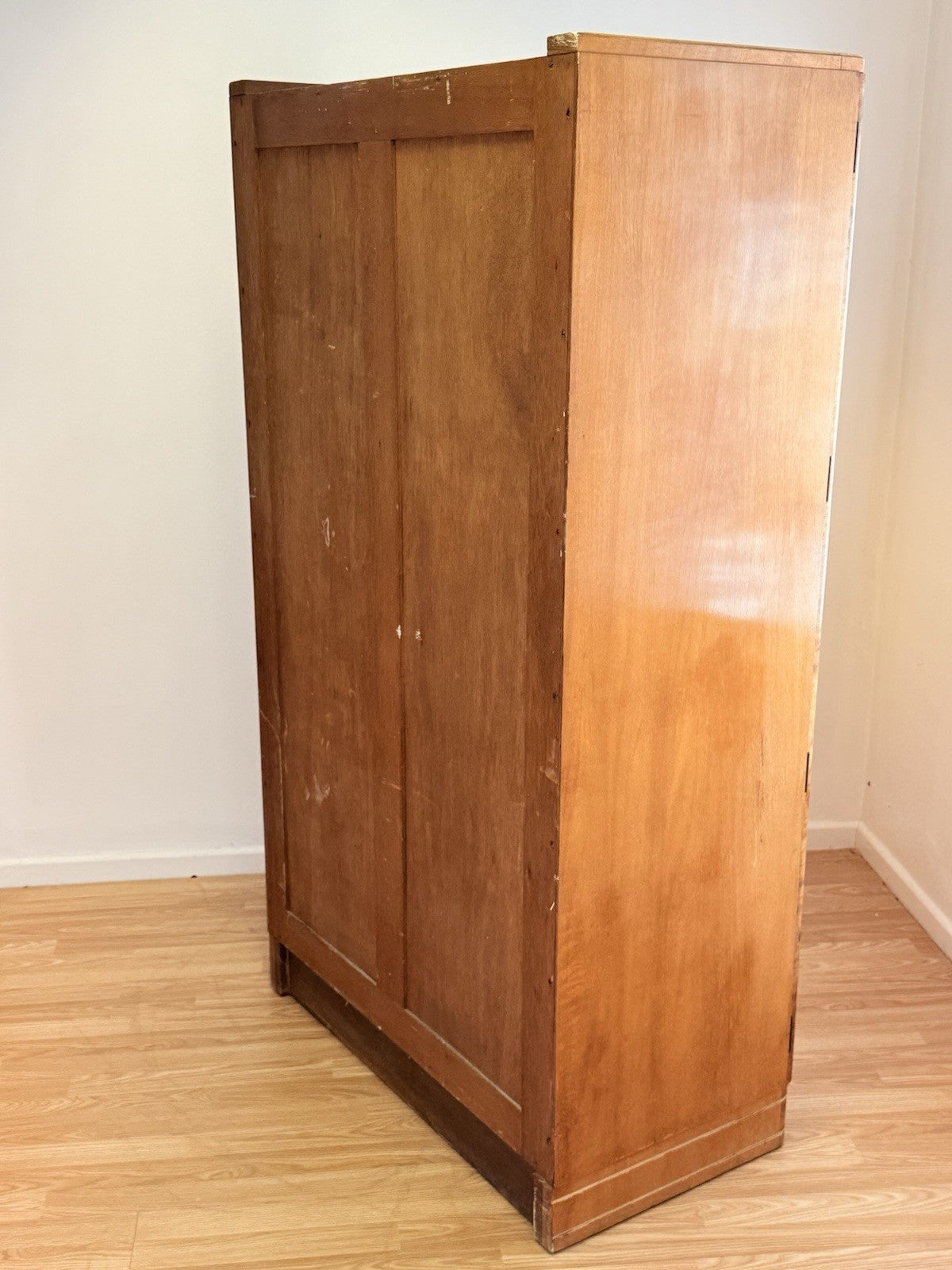 Back and side of the bird's eye maple wardrobe