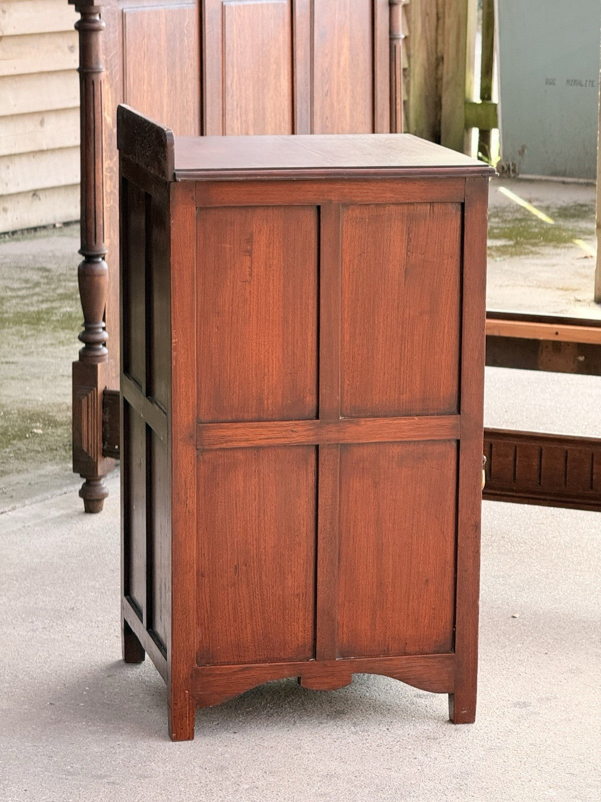 Panelled side of the Arts & Crafts mahogany cabinet