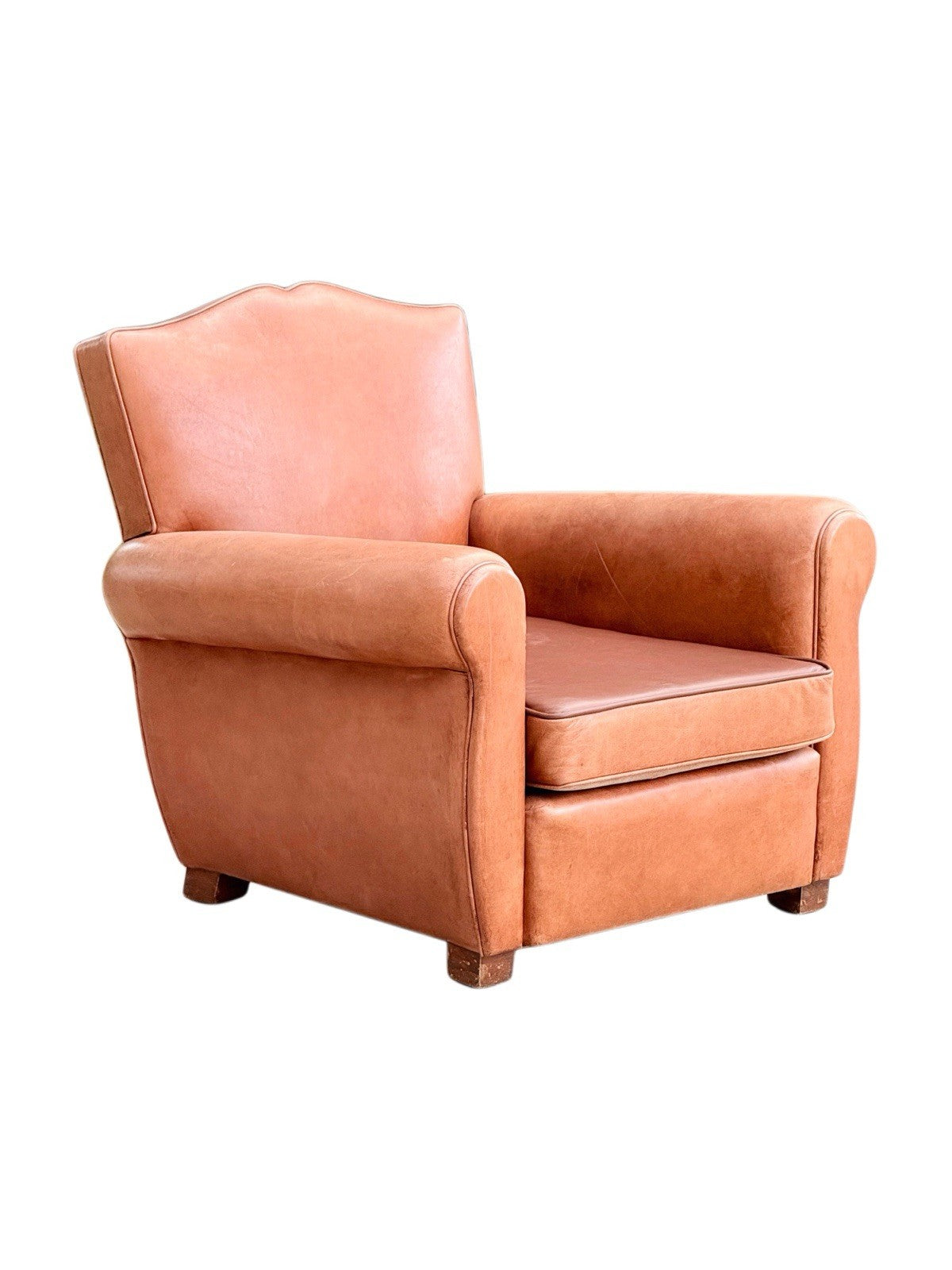French Art Deco moustache leather club armchair, c.1930s, tan leather with arched moustache back, rolled arms and brass studs