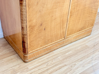Close-up of plinth base and banded edge, maple wardrobe