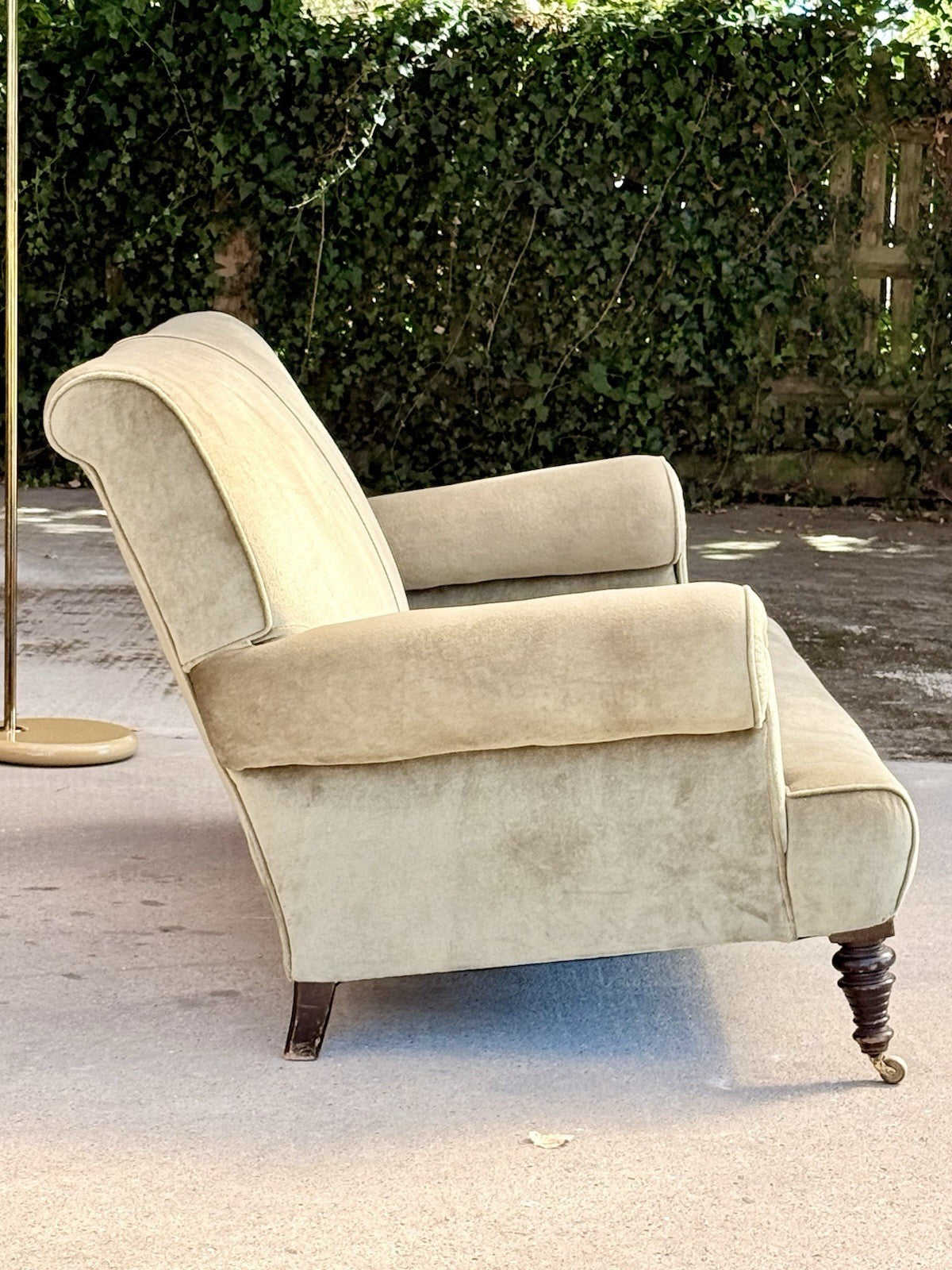 19th-century English sofa, side profile showing deep seat and scroll arm
