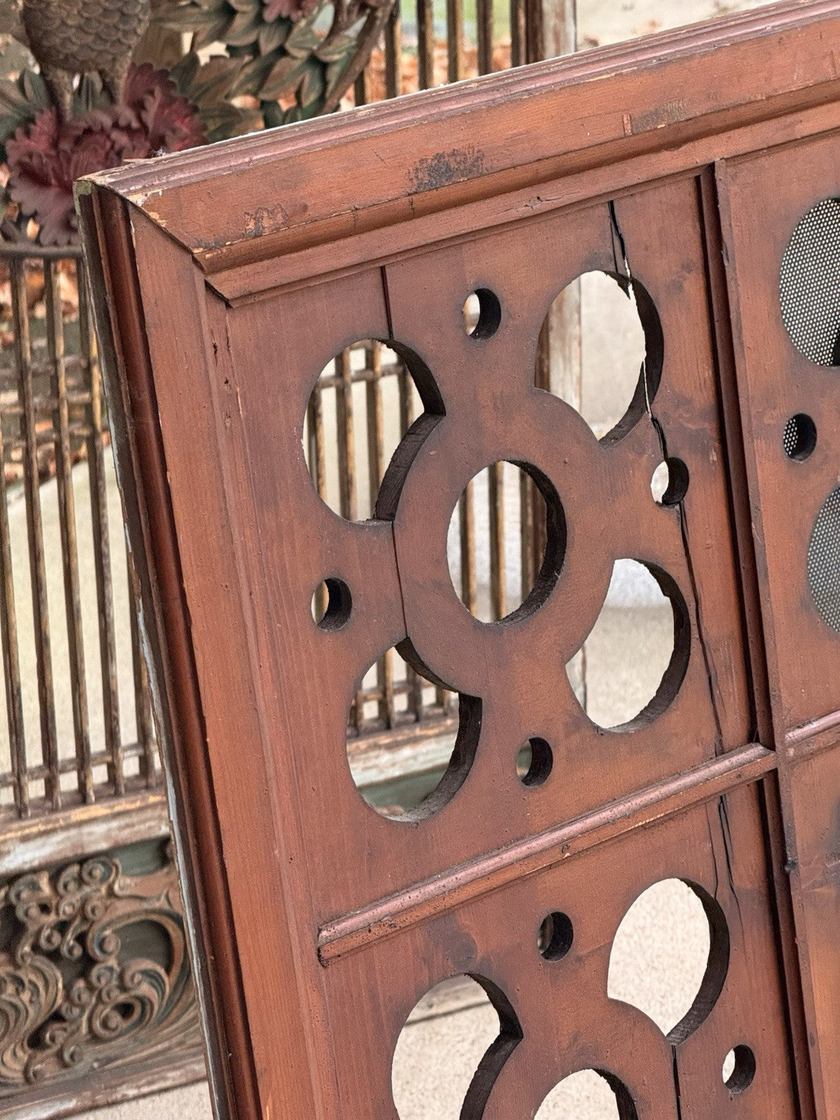 Close-up of moulded corner of the pine ventilation panel