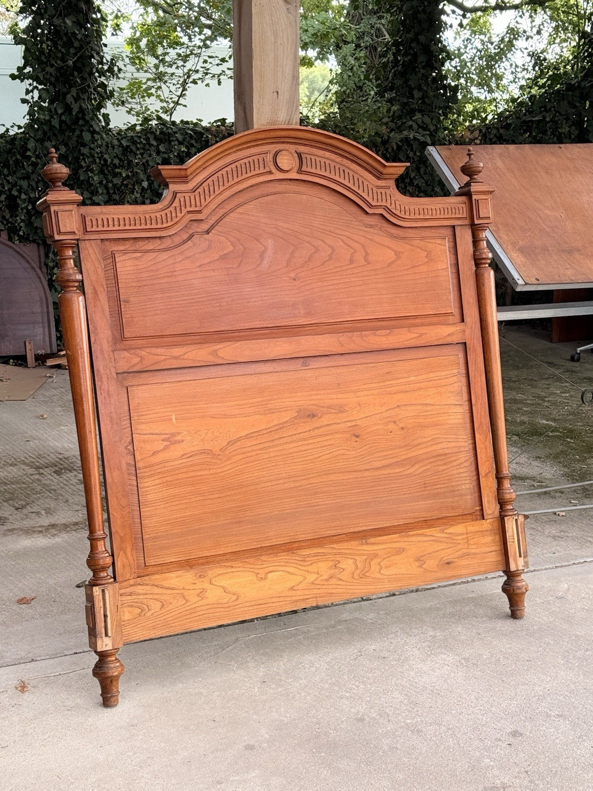 French Henri II carved ash footboard with arched top and turned posts