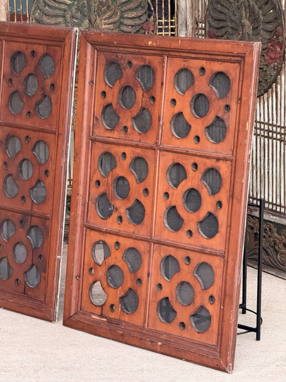 Antique carved pine ventilation panel, angled view