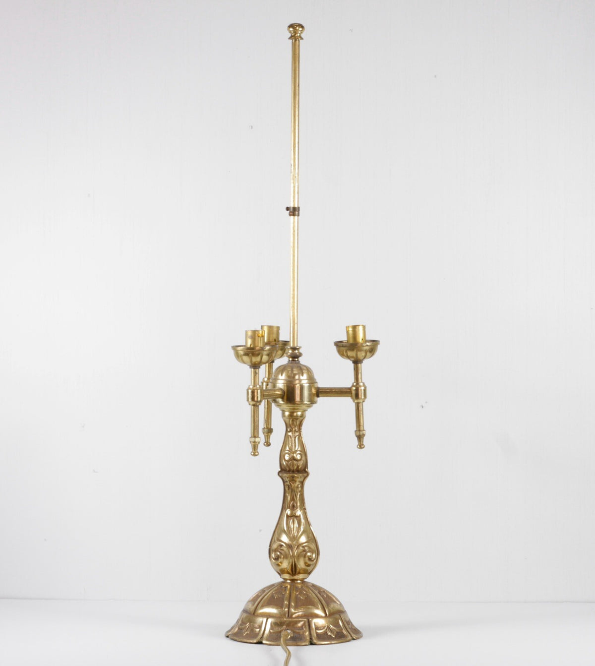Vintage French Art Nouveau brass bouillotte lamp without shade, angled view
