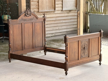 French antique oak Henri II double bed, assembled, side view