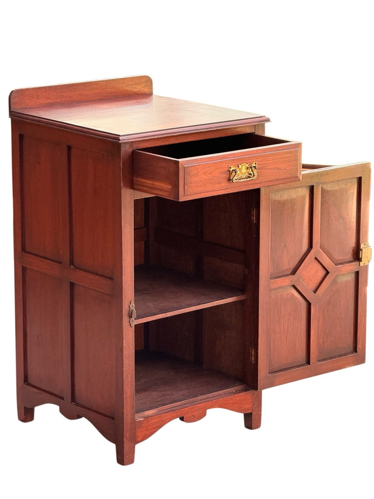 Arts & Crafts mahogany cabinet with drawer and door open, showing interior shelf