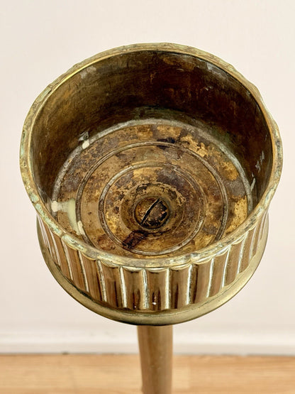 View inside the fluted brass urn of the Hine & Co lamp