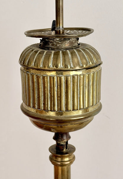 Close-up of fluted brass urn font and gallery