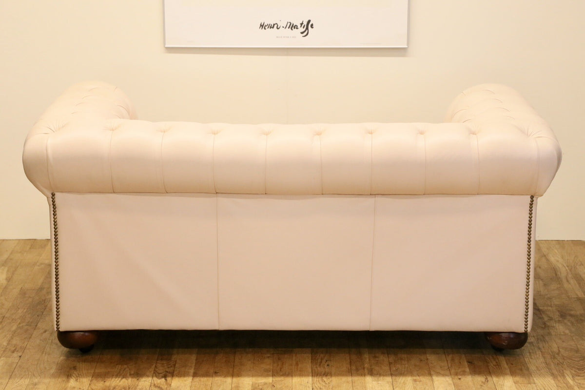 Back view of the Cream leather Chesterfield 2 seater sofa