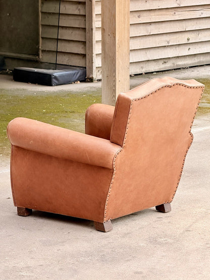 French Art Deco moustache leather club armchair, rear three-quarter view