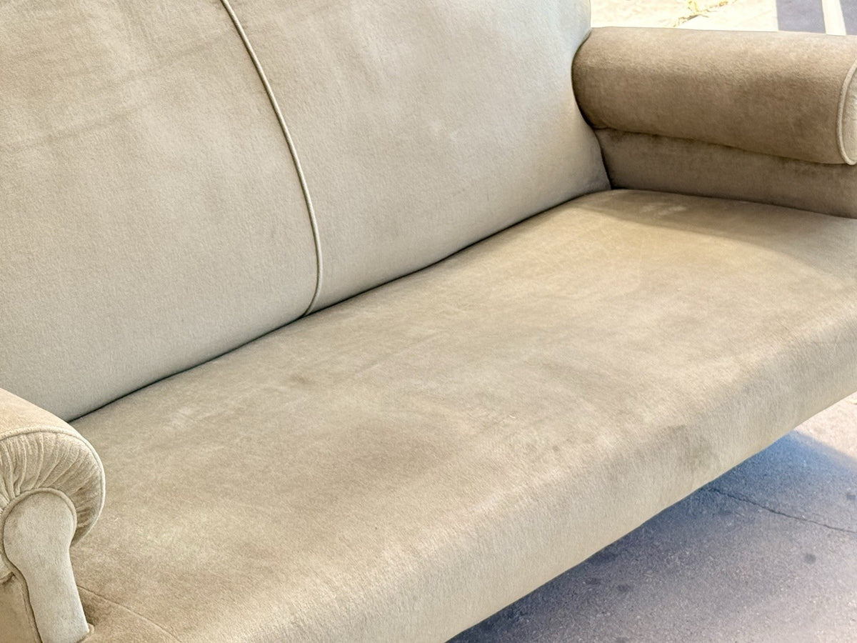 19th-century English sofa, detail of deep seat and rolled arm