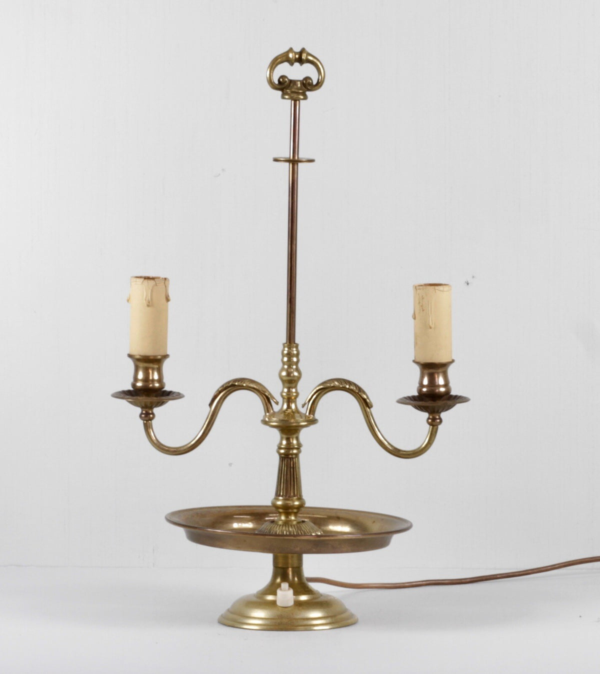 Vintage French ormolu brass bouillotte lamp with two arms rising from the column above a chased tray base