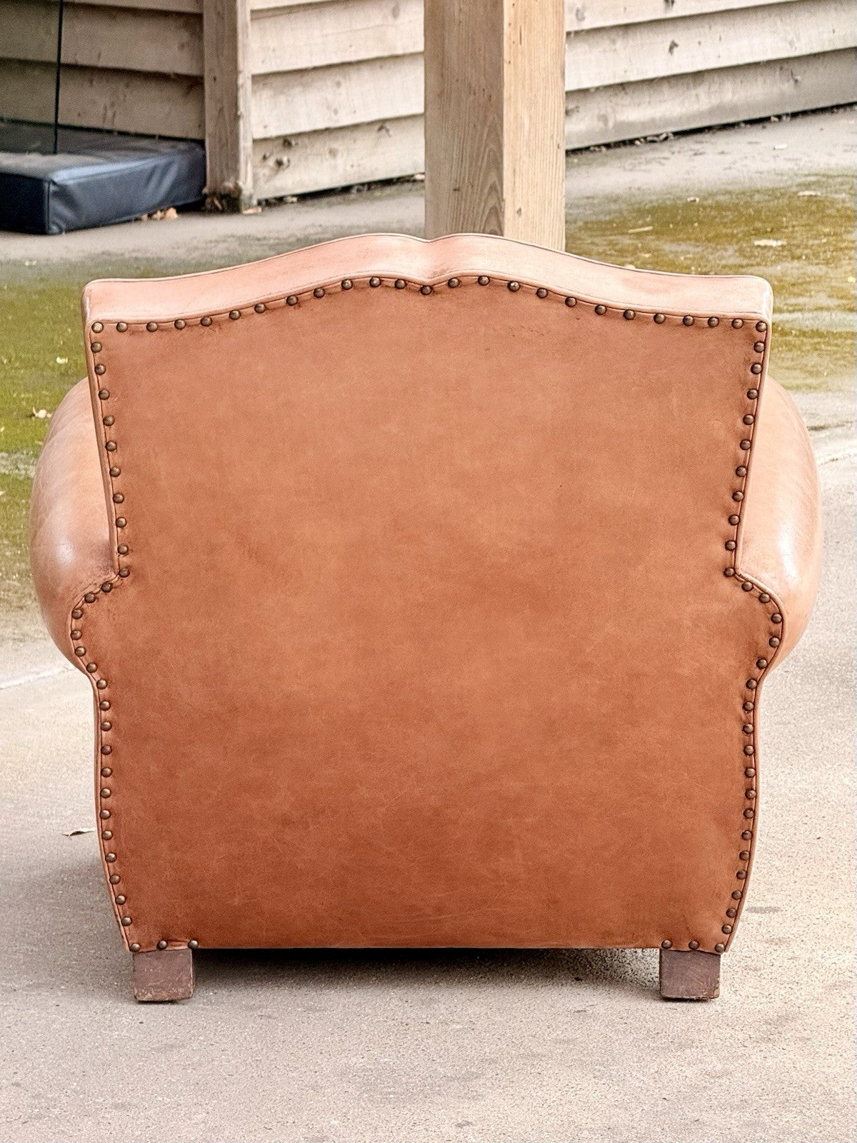 Back of the Art Deco moustache club armchair with brass stud trim